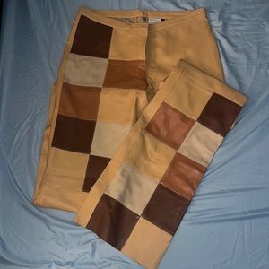 Flare, leather, brown palette, colored pants. Never worn.